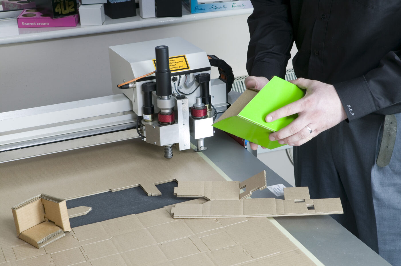 Sheet board being cut